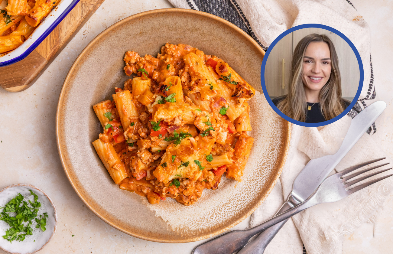 A plate on a table containing a Creamy Cajun Pork Pasta Bake.