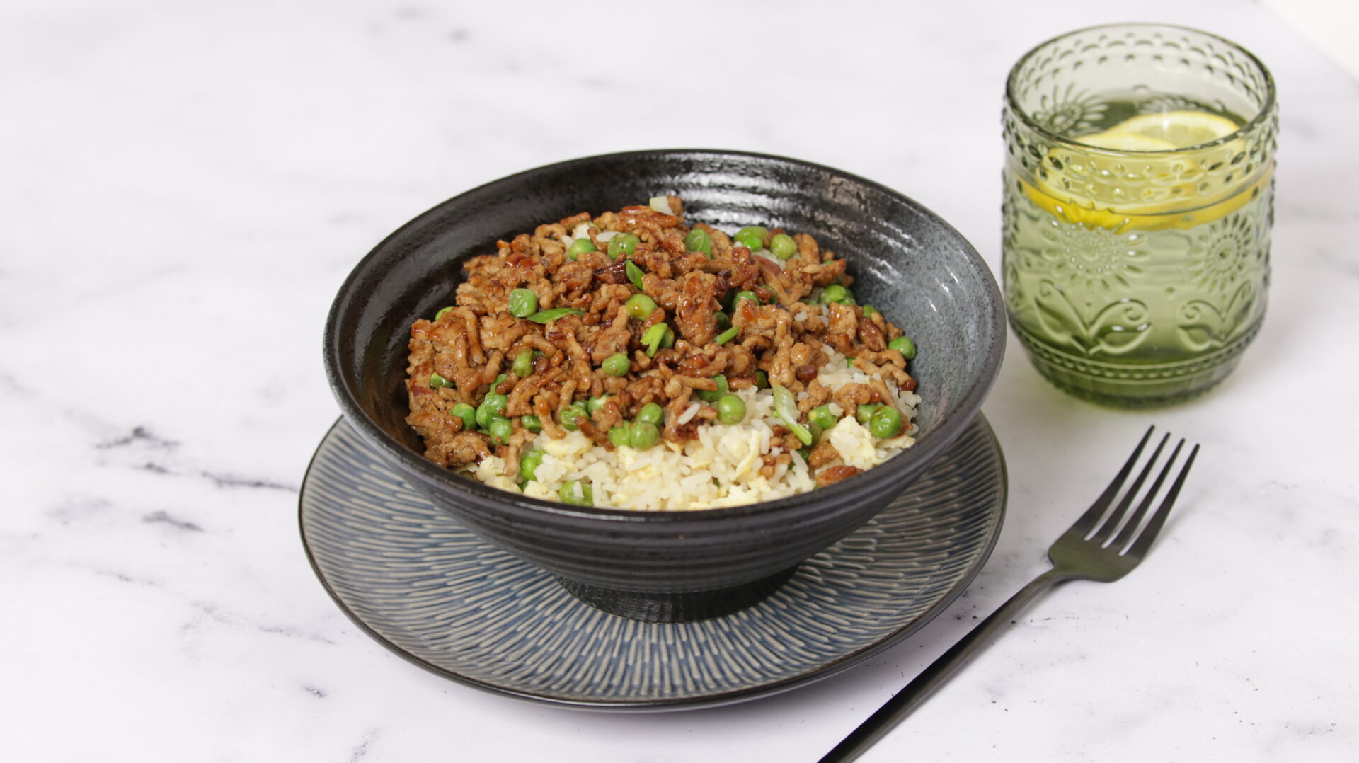 A bowl containing pork mince with rice.
