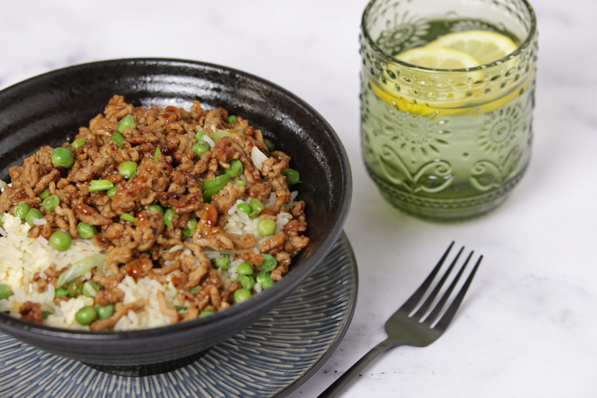 A bowl containing pork mince with rice.
